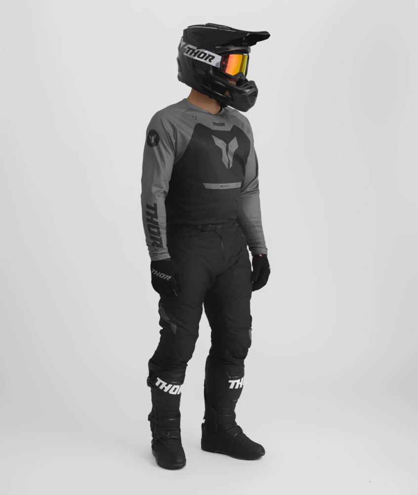 A Motokrosové - enduro kalhoty a dres / motokrosový - enduro komplet  THOR RIDEMODE MENACE barva černá/šedá velikost 38+2XL