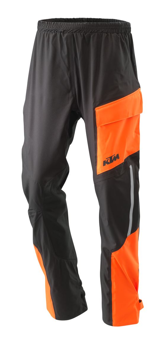 A Pláštěnka - pláštěnkové voděodolné kalhoty KTM RAIN PANTS barva černá/oranžová VELIKOST XL