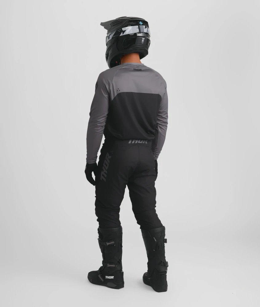 A Motokrosové - enduro kalhoty a dres / motokrosový - enduro komplet  THOR RIDEMODE MENACE barva černá/šedá velikost 38+2XL