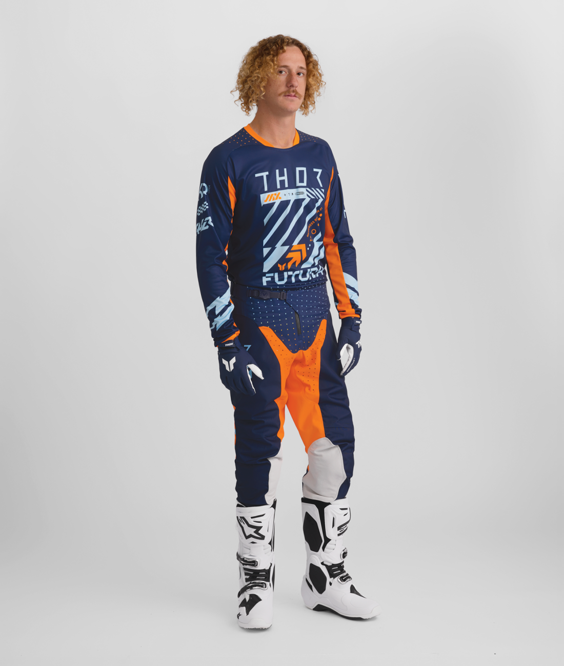 a Motokrosový / enduro komplet kalhot a dresu THOR LAUNCHMODE FUTURA barva navy/oranžová velikost 34+L 