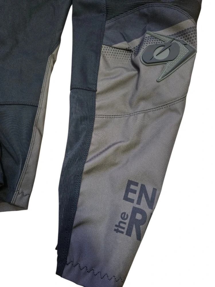 A Motokrosové / enduro kalhoty ONEAL ELEMENT RACEWEAR barva černá/olivová/červená velikost 30