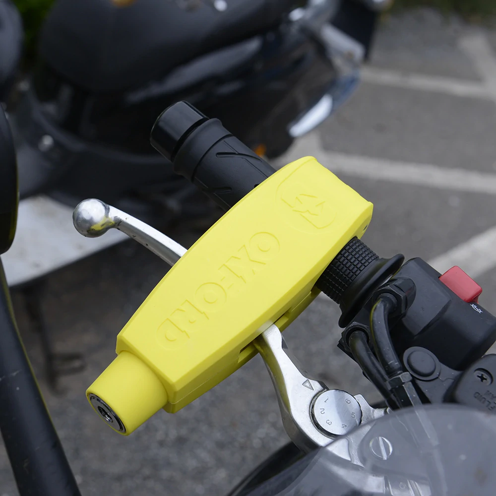 Zámek páčky přední brzdy motocyklu  OXFORD LEVERLOCK LK301 barva žlutá, pro průměr gripů od 28 do 38 mm