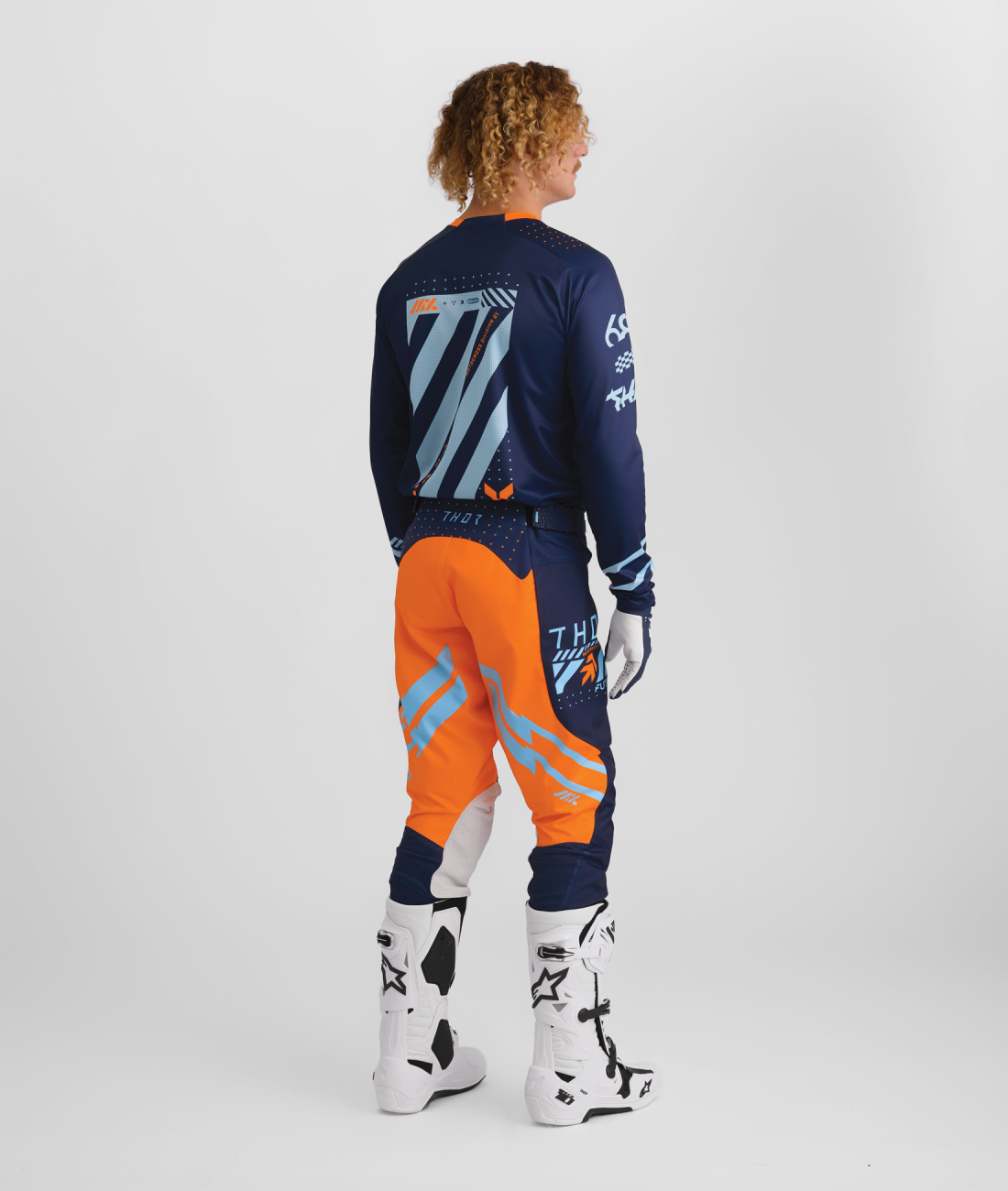 a Motokrosový / enduro komplet kalhot a dresu THOR LAUNCHMODE FUTURA barva navy/oranžová velikost 34+L 